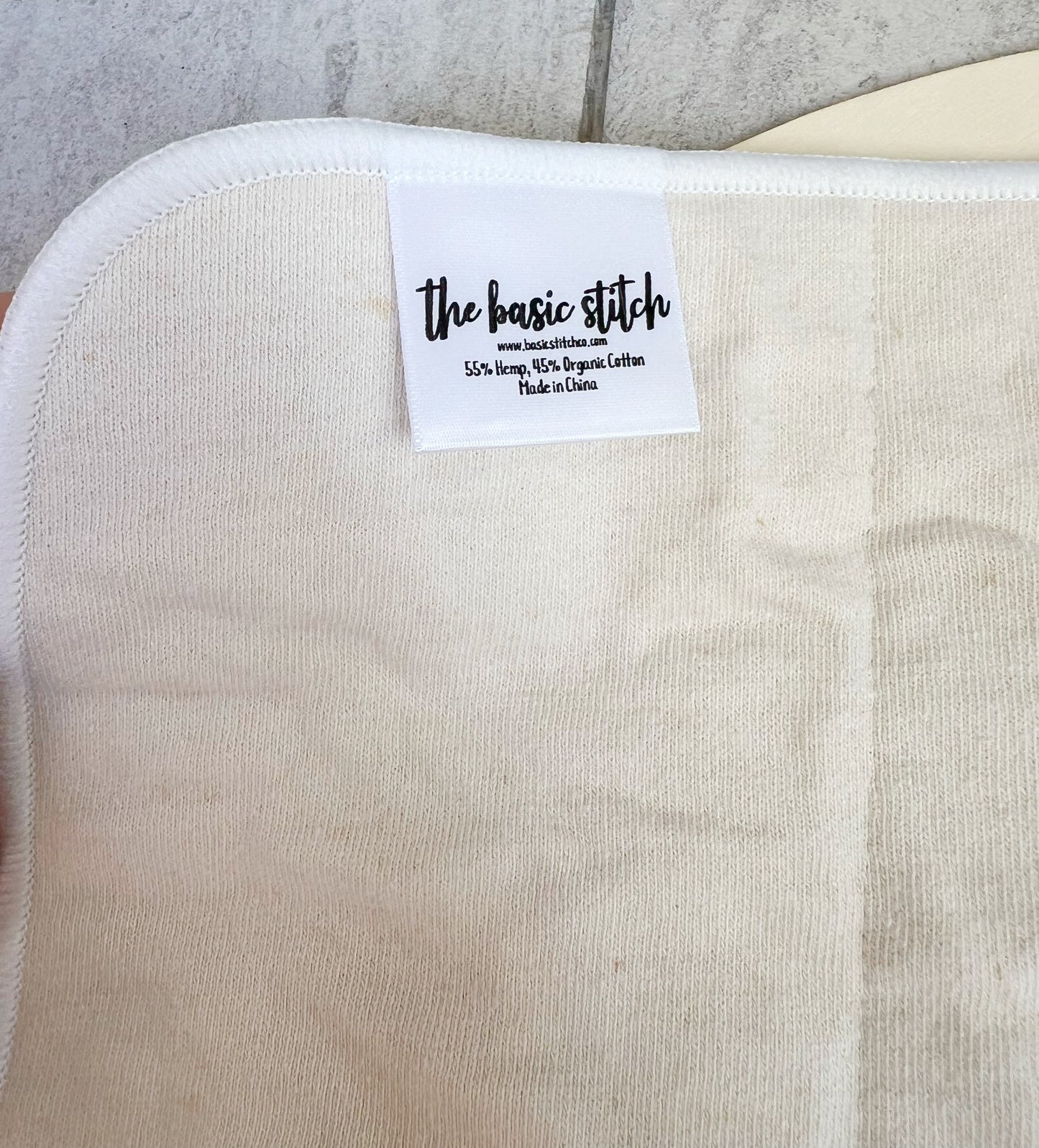 3-layer hemp trifold cloth diaper insert tag. The Basic Stitch, www.basicstitchco.com 55% hemp, 45% organic cotton. Made in China